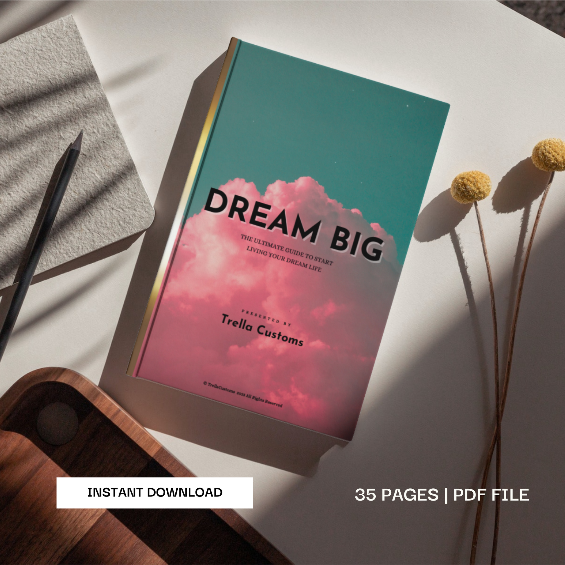 Dream Big - The ultimate guide to start living your dream life ebook on table that can be used for multiple IOS and android devices